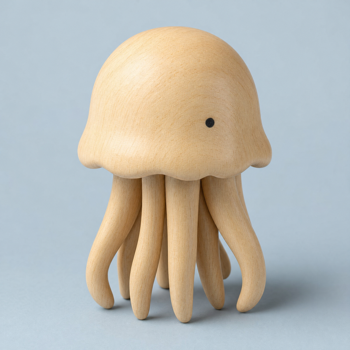Jorlaxis Jellyfish: a pale wooden jellyfish with a rounded bell and short carved tentacles